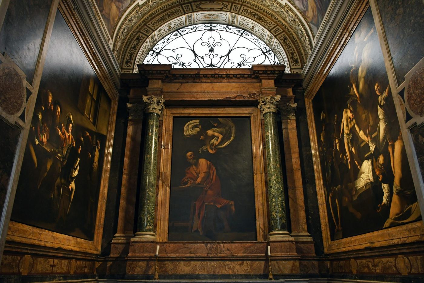 The Contarelli Chapel: the Calling (left), the altarpiece (centre), the Martyrdom (right)