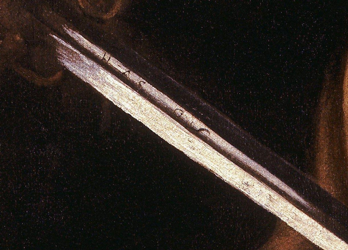 David with the Head of Goliath — the inscription on the sword